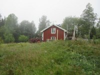 Traktoren er nu kørt til den anden ende af huset