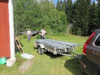 Sidste læs med stillads pakkes på traileren
